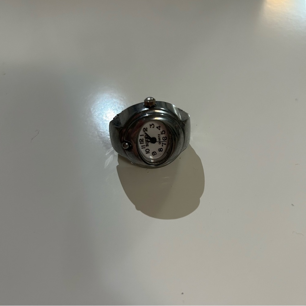 silver analogue watch ring